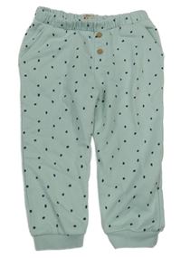 Světlezelené puntíkaté tepláky s knoflíky