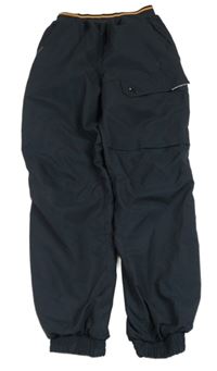 Tmavosivé šušťákové outdoorové funkčné nohavice zn. Quechua