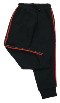 Čierne tepláky s pruhom Next