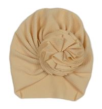 Meruňková vzorovaná turbanová čepice s 3D květem