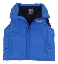 Modrá šušťáková zateplená vesta s výšivkou