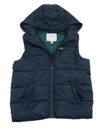 Tmavomodrá šušťáková zateplená vesta s kapucňou