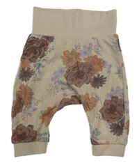 Světlepudrové turecké tepláky s kvietkami H&M