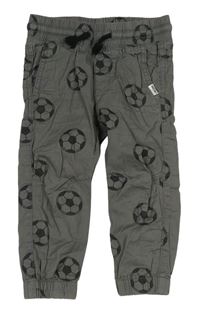 Sivé plátenné cuff nohavice s futbalovymi loptami H&M