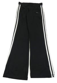 Černé sportovní flare legíny s bílými pruhy a logem Adidas