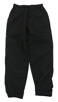 Černé šusťákové kalhoty H&M
