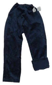 Tmavomodré plyšové zateplené tepláky s 3D motýlkem 