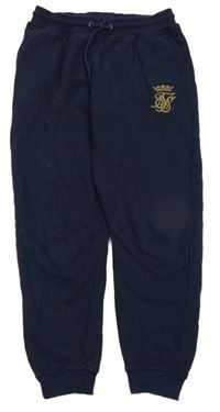 Tmavomodré tepláky s výšivkou