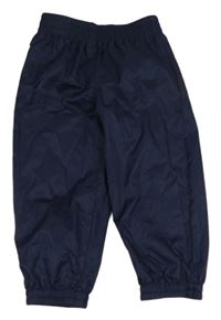 Tmavomodré šusťákové podšité kalhoty