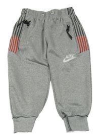 Šedé melírované sportovní tepláky Nike