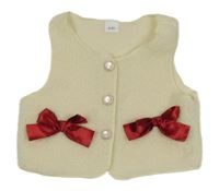 Smotanová huňatá vesta s mašľami