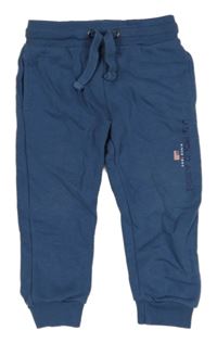 Tmavomodré tepláky s logem U.S. Polo Assn.