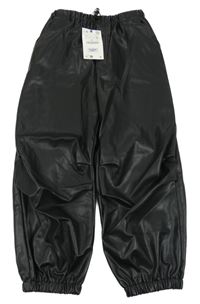 Nové - Čierne koženkové cuff zateplené nohavice Zara
