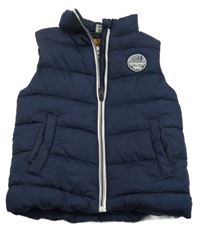 Tmavomodrá šusťáková prošívaná zateplená vesta s nápisem Dopodopo