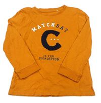 Oranžové tričko s nápismi a písmenem Topolino