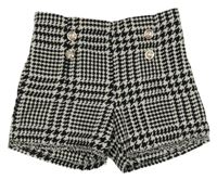 Černo-bílé vzorované úpletové kraťasy s gombíky 