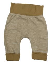 Hnědé pruhované tepláky s medvědem Topomini