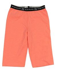 Neónově ružové elastické kraťasy River Island