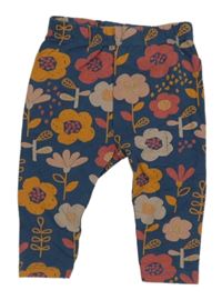 Tmavomodré tepláky s kvietkami M&Co.