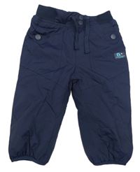 Tmavomodré šusťákové zateplené kalhoty s nášivkou Next