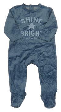 Tmavomodrý sametový overal s nápisem 