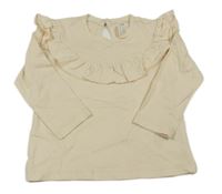Smetanové triko s volánkem H&M