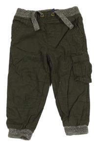 Tmavozelené plátenné podšité nohavice s úpletovým pasom Lupilu