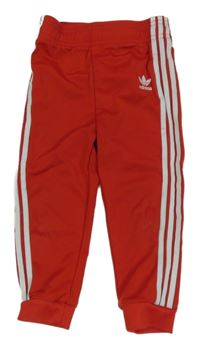 Červené športové tepláky s logom Adidas