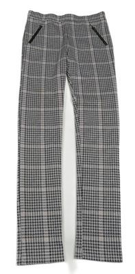 Černo-světlerůžovo-bílé vzorované tregíny se zipy Nutmeg