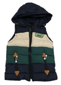 Tmavomodro-smetanovo-zelená šušťáková zateplená vesta s nášivkou a kapucňou