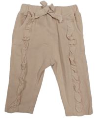 Pudrové tepláky s volánky Zara