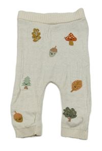 Smotanové pletené tepláky s obrázkami Tu