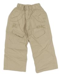 Béžové plátenné nohavice s výšivkami