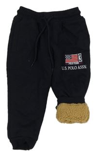 Tmavomodré zateplené tepláky s vlajkou zn. U.S. POLO ASSN