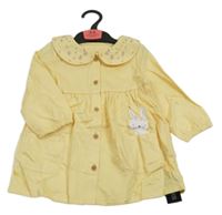 Nové - Žluté plátěné propínací šaty s králíkem a květovaným límečkem Dunnes