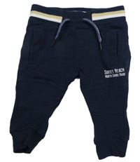 Tmavomodré tepláky s nápisom Dirkje