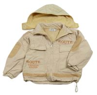 Svetlobéžová šušťáková jarná bunda s nápismi a kapucňou