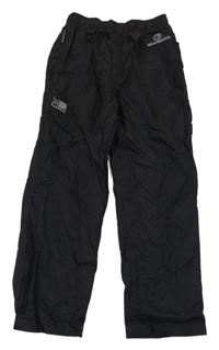 Čierne šušťákové funkčné nohavice s logom Karrimor