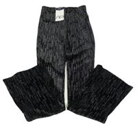 Nové - Černé třpytivé sametové flare kalhoty Zara