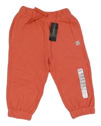 Nové - Oranžové tepláky s hvězdičkou Dunnes