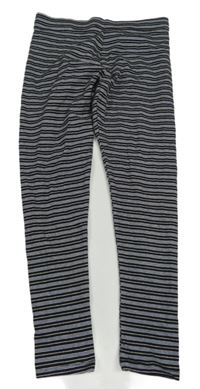 Černo-bílo-zlaté pruhované legíny Next