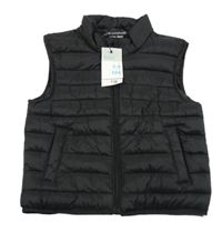 Nové - Čierna šušťáková zateplená vesta Primark