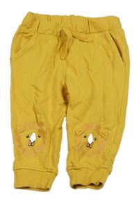 Žlté tepláky so lvy H&M