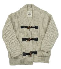 Světlebéžový vlněný propínací svetr Zara