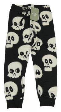 Nové - černé tepláky s lebkami H&M