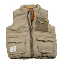 Hnědá šusťáková zateplená vesta s kapsami Next