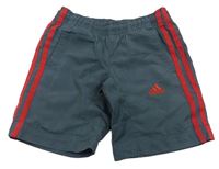 Šedé šusťákové kraťasy s logem Adidas