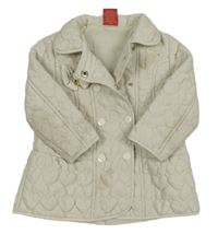 Smotanový šušťákový zateplený kabát s prešívanými srdiečkami a mašlou KYLY