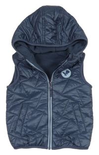 Šedomodrá šušťáková prešívaná zateplená vesta s nášivkou a kapucňou dunnes