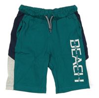 Zeleno-tmavomodré teplákové kraťasy s nápisom kids